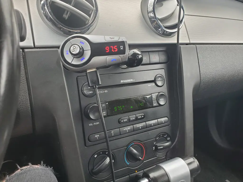 GoGroove Flexsmart X2 Review, picture of FM transmitter with 2006 mustang radio.
